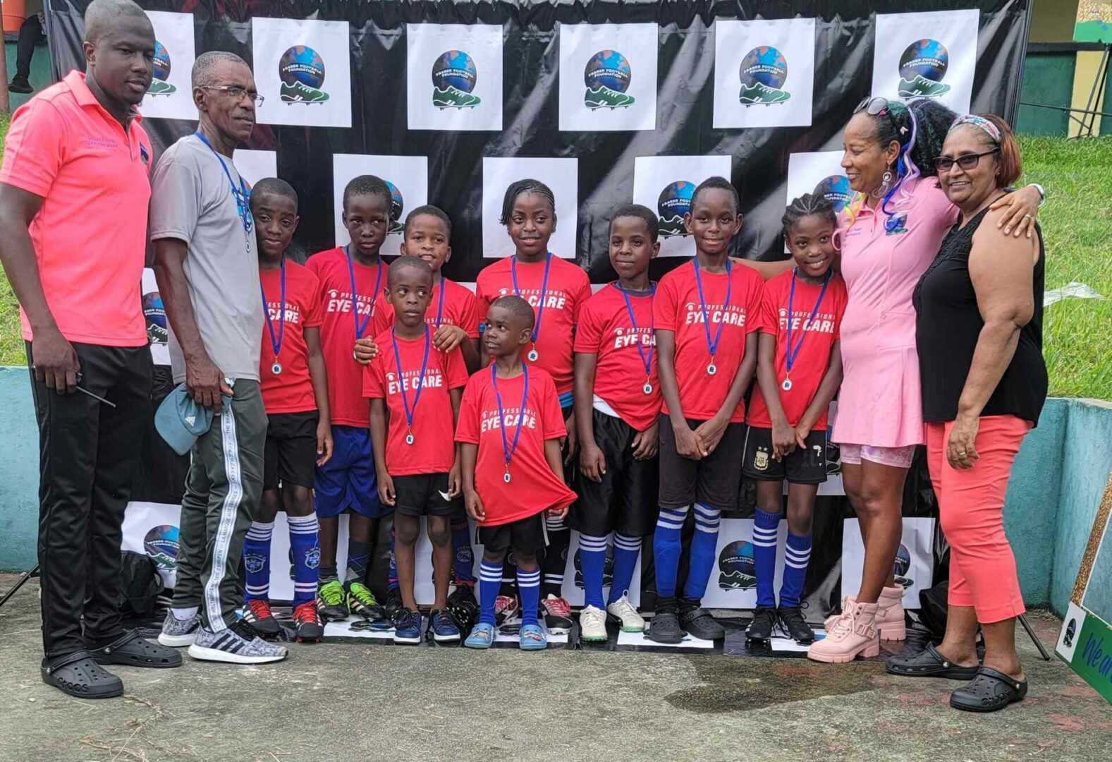 A group of young people standing next to each other.